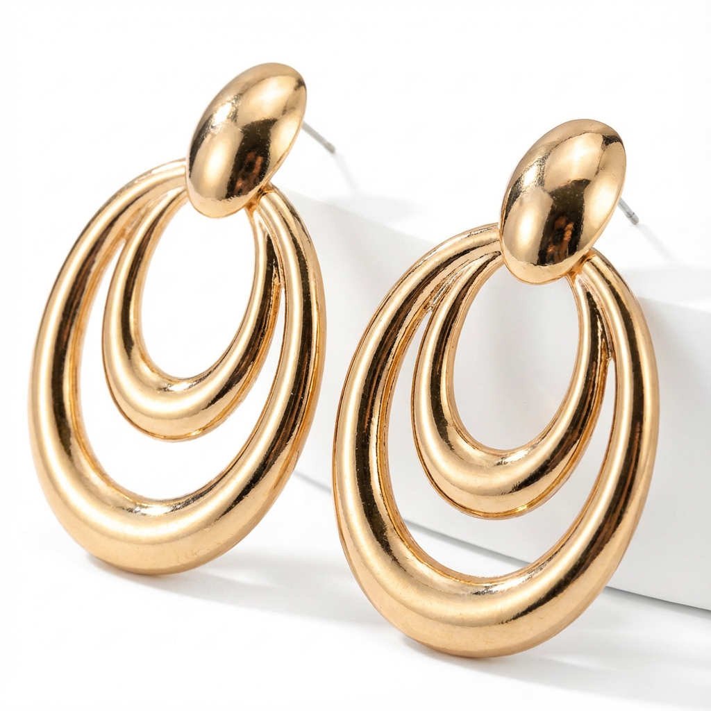 Raw product photo: gold double-hoop earrings on a clean white background