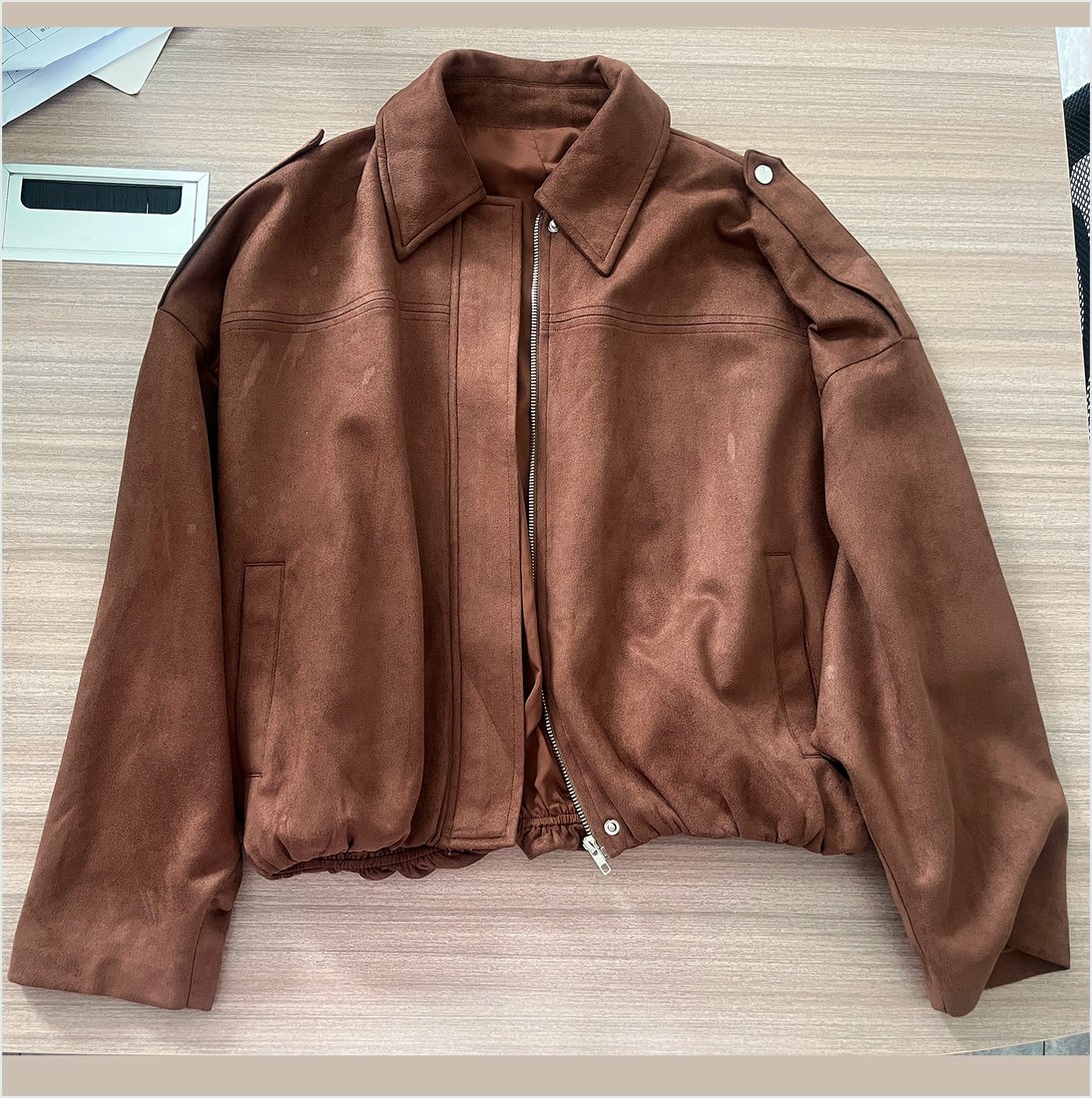 Jacket flat lay photo before ghost mannequin conversion