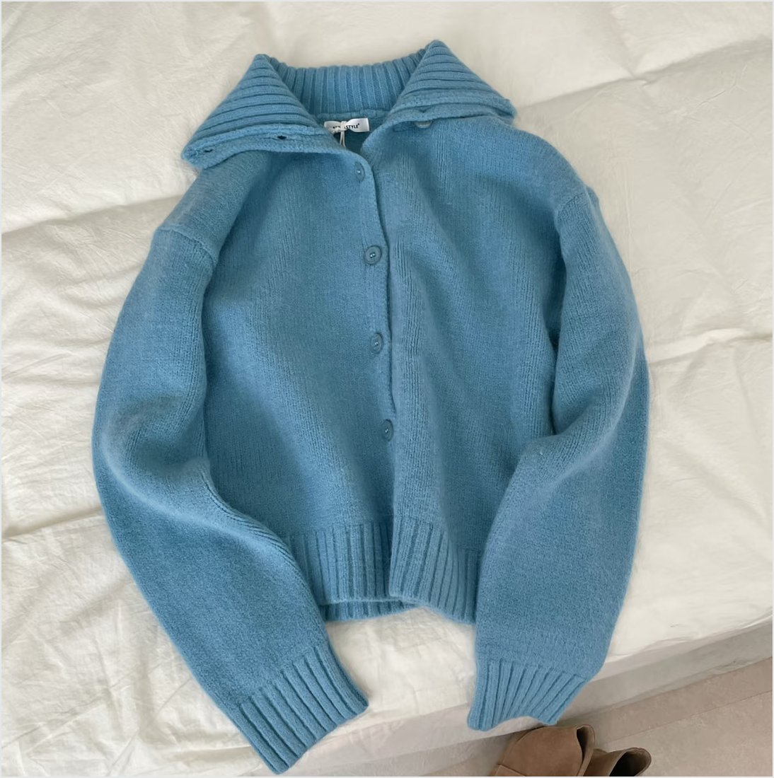 Sweater flat lay photo before ghost mannequin conversion