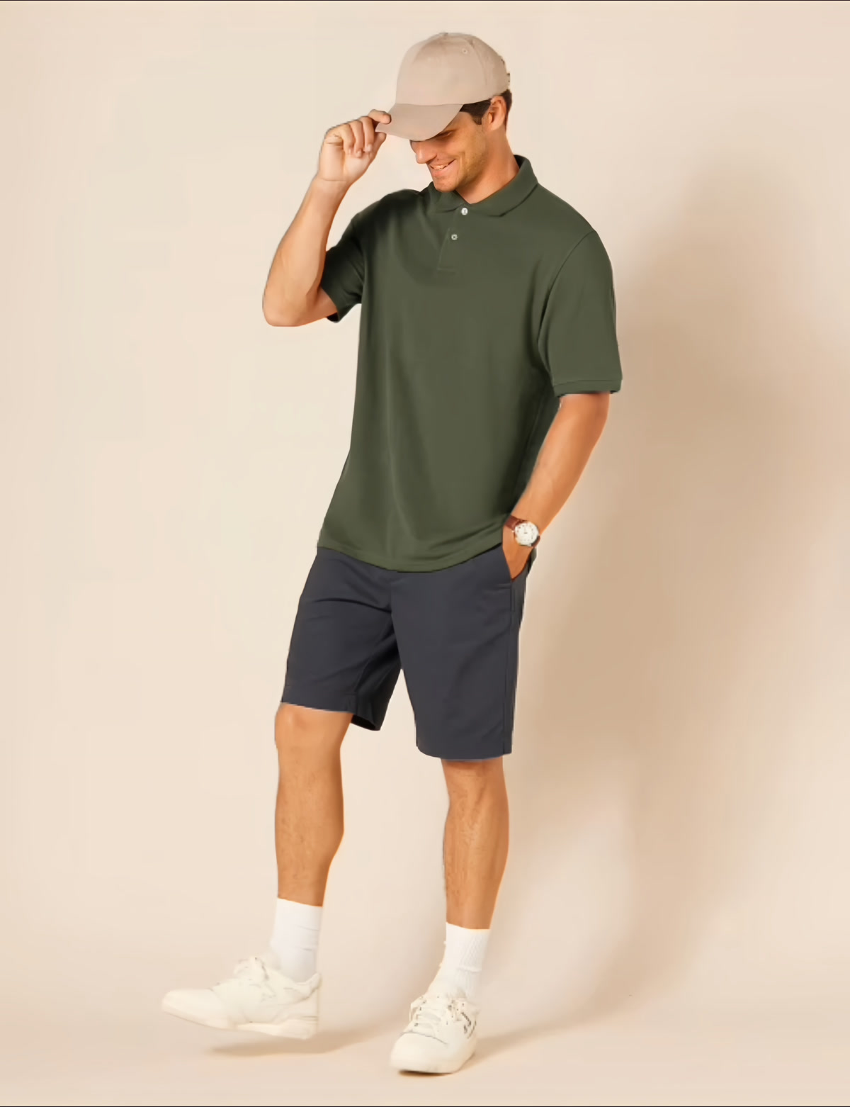 Source product photo of a model wearing a green polo and navy shorts