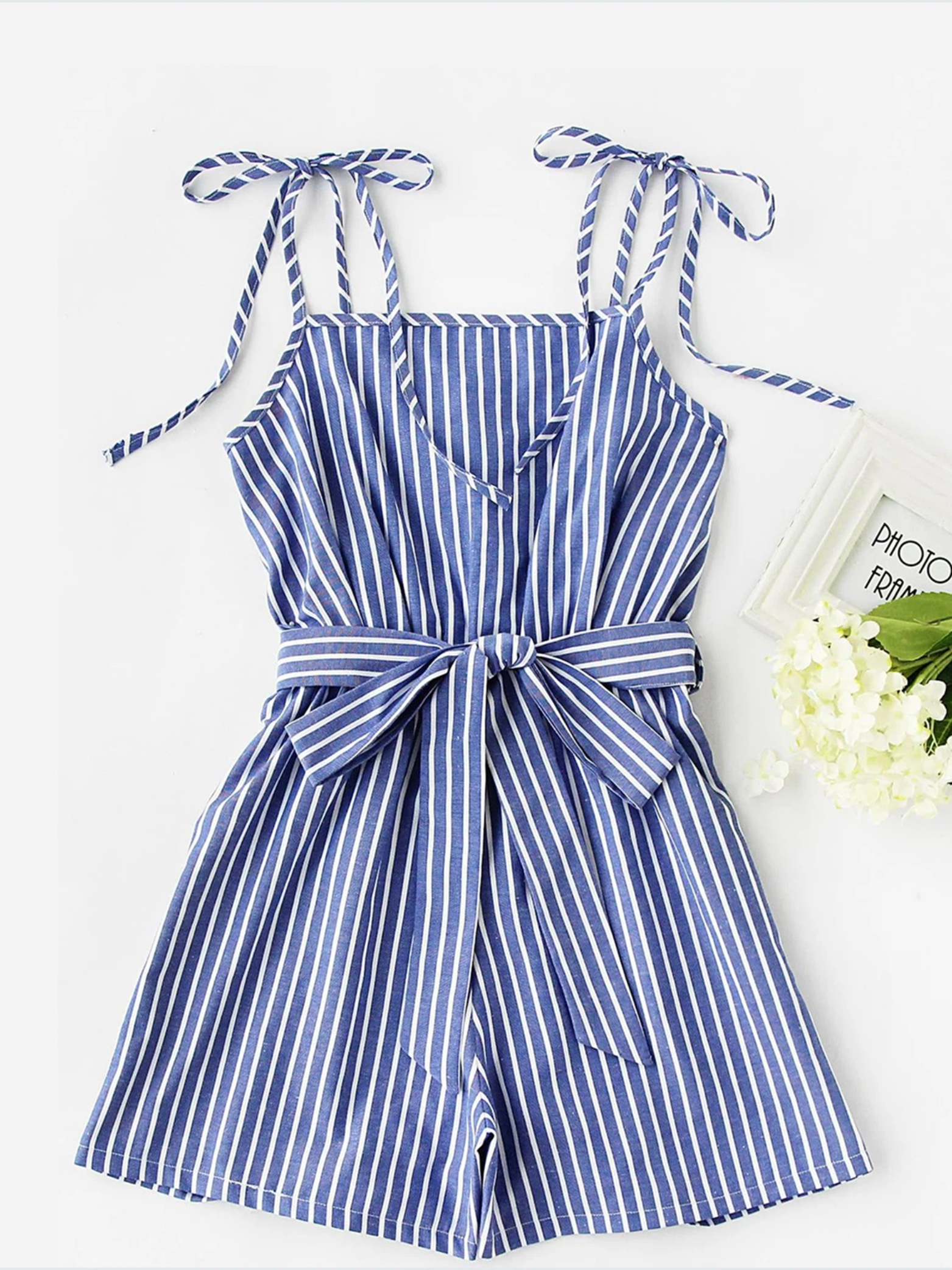 Striped romper flat lay source photo