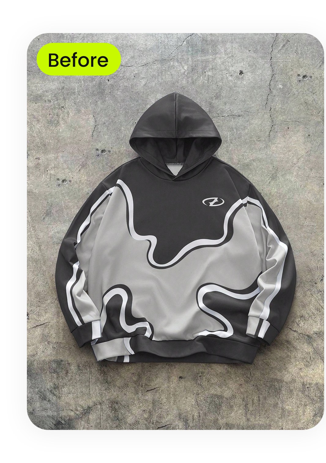 Thrifted graffiti-print streetwear hoodie photographed flat on rough concrete
