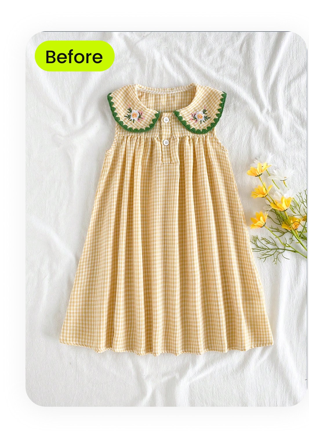 Vintage yellow gingham child's dress with peter-pan collar photographed flat with daffodil accents